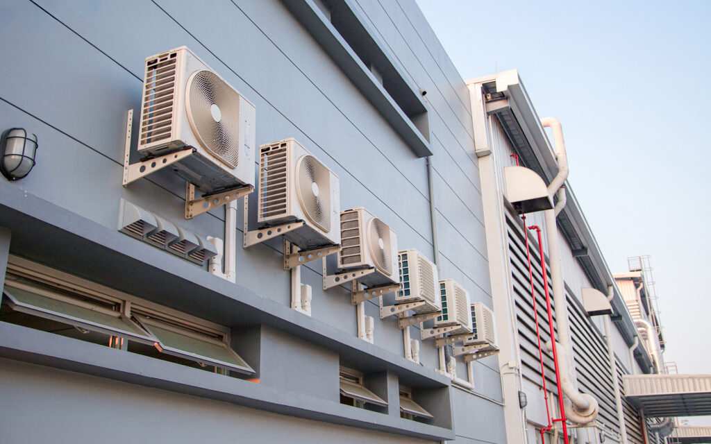 AC Compressor units on exterior of commercial building